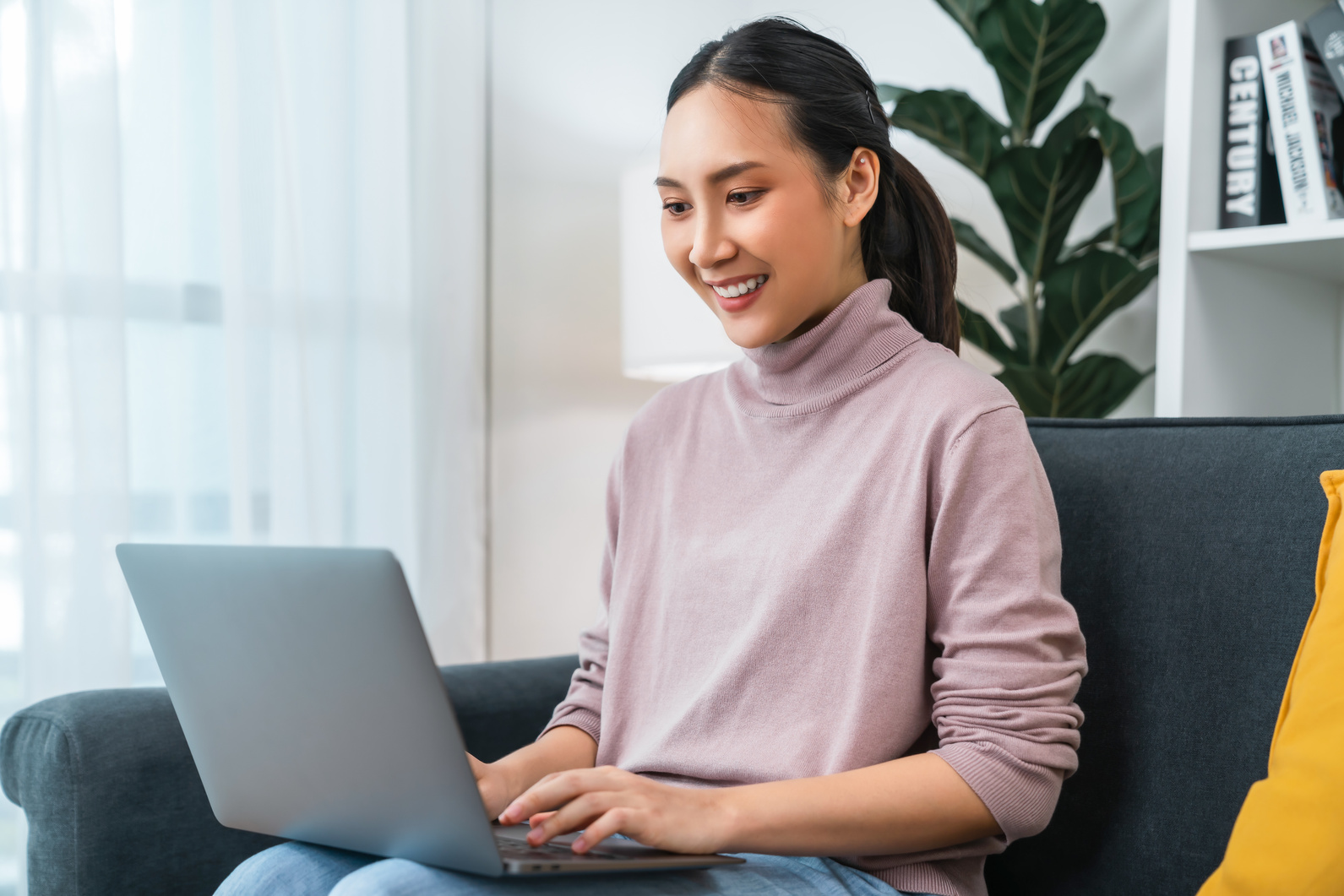 woman using laptop computer.